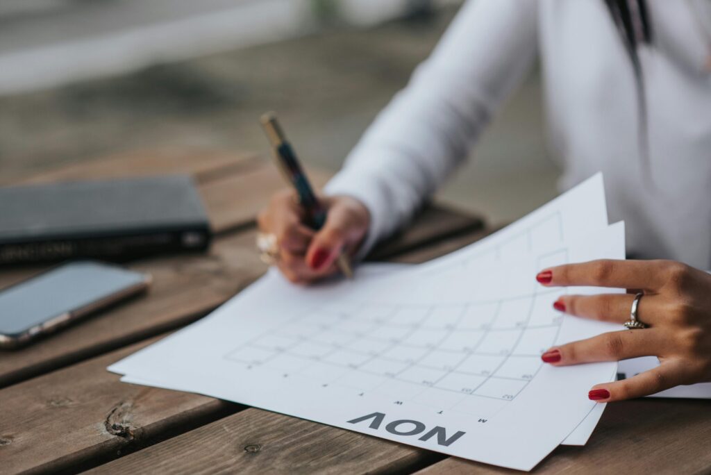 saleswoman planning closing deals in a month
